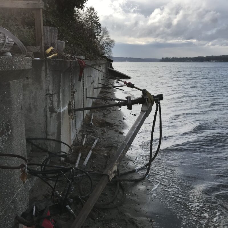 Tie Back system for seawall stabilization for foundation repair services in the Puget Sound, Washington state.